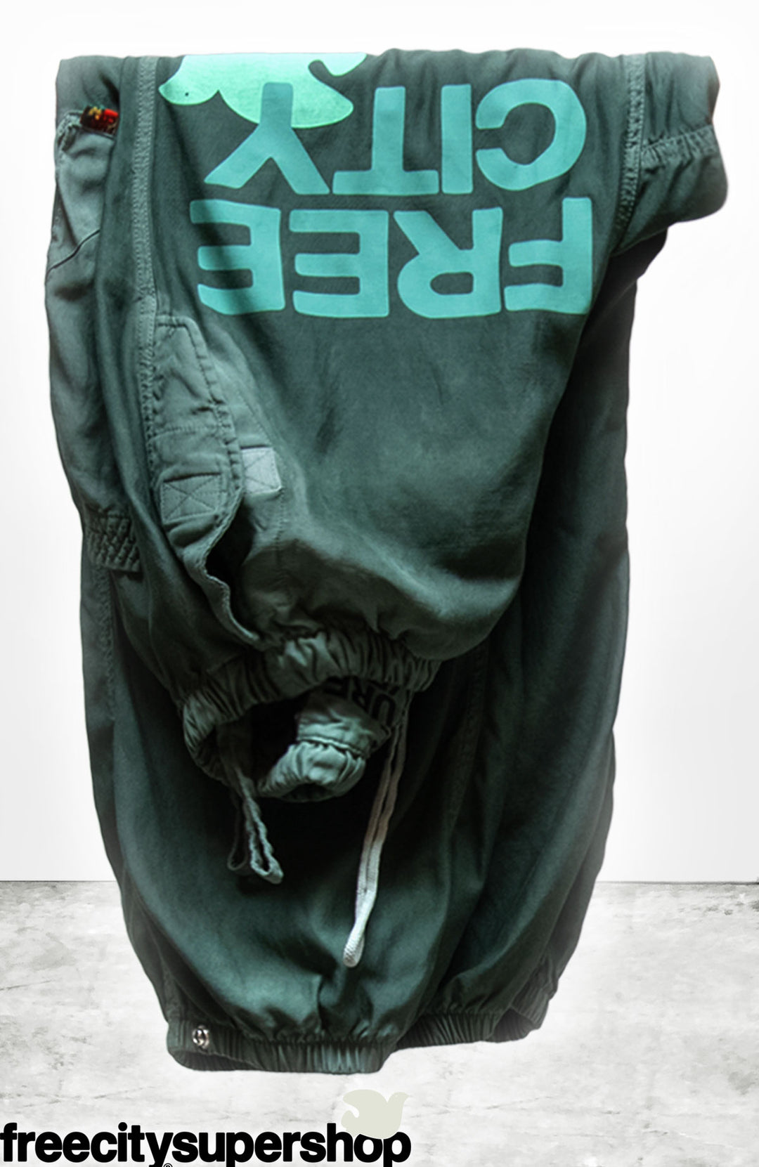 FREECITY SATIN JUMP PANT Green M フリーシティ FLAP/SNAP FREECITY MATTE/SATIN AIRJUMP PANT - surplus powder
